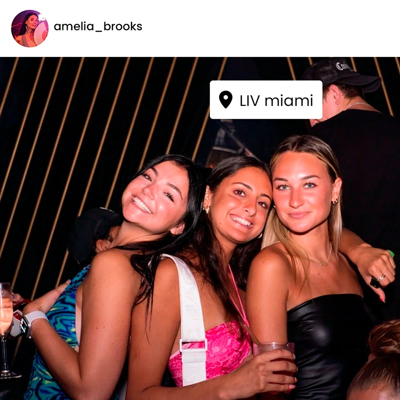 Party crowd enjoying a high-energy Miami nightclub night party with music and lights