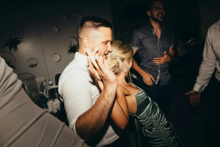 Group enjoying a party in Miami with nightlife, music, and city vibes