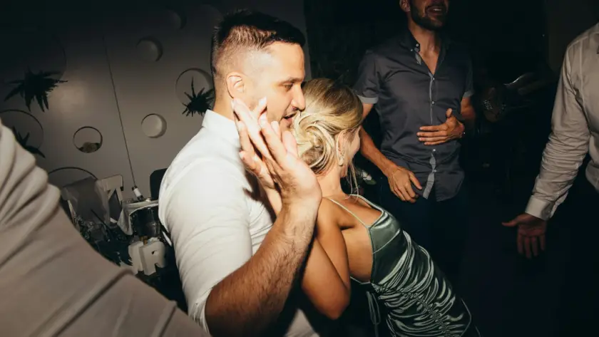 Group enjoying a party in Miami with nightlife, music, and city vibes