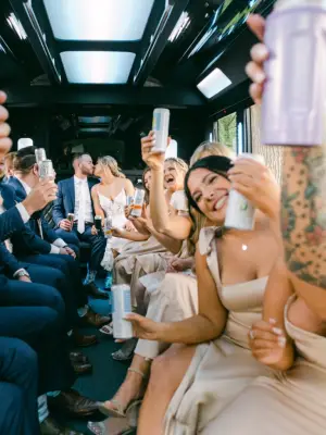 Group enjoying a Miami party bus with music, lights, and nightlife vibes